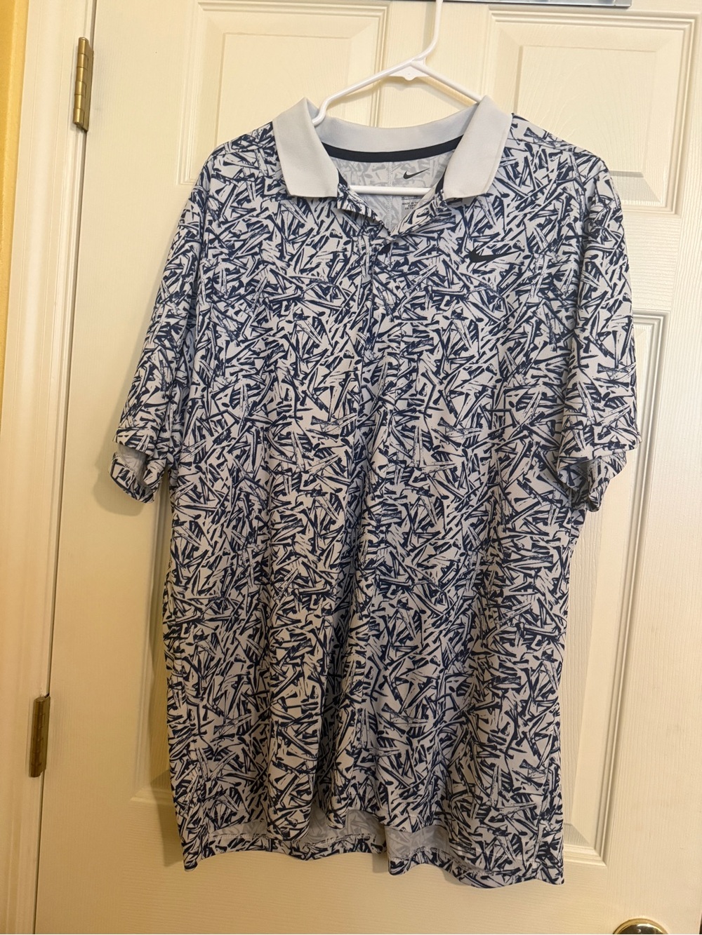 Nike Men's White Polo with Navy Abstract Print